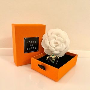 Leona di Lucca fashion jewerly ring and camellia brooch